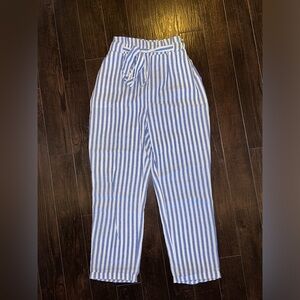 Blue and white striped paper bag pants